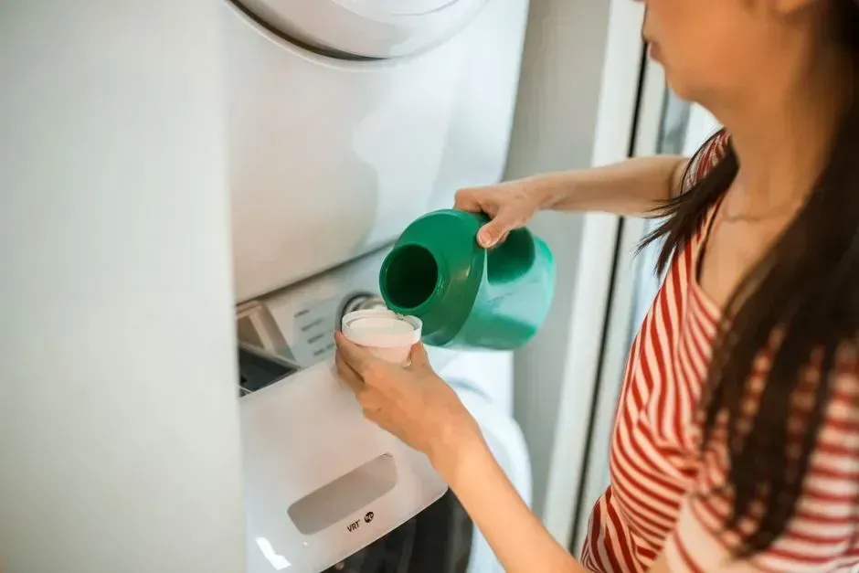 2. Using Too Much Laundry Detergent (Image Credits: Pexels)