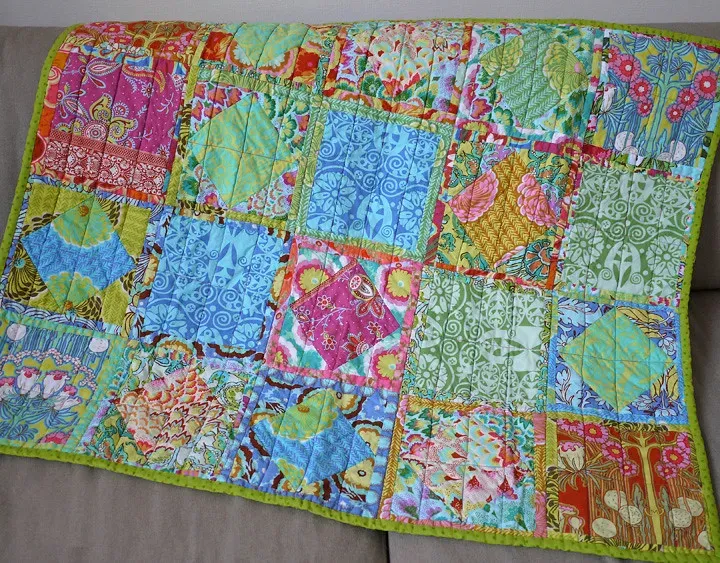 A Handmade Quilt (Saké Puppets, Flickr, CC BY 2.0)
