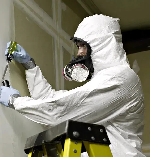 6. Asbestos Disturbance or Removal (Asbestos Testing, Flickr, CC BY-SA 2.0)