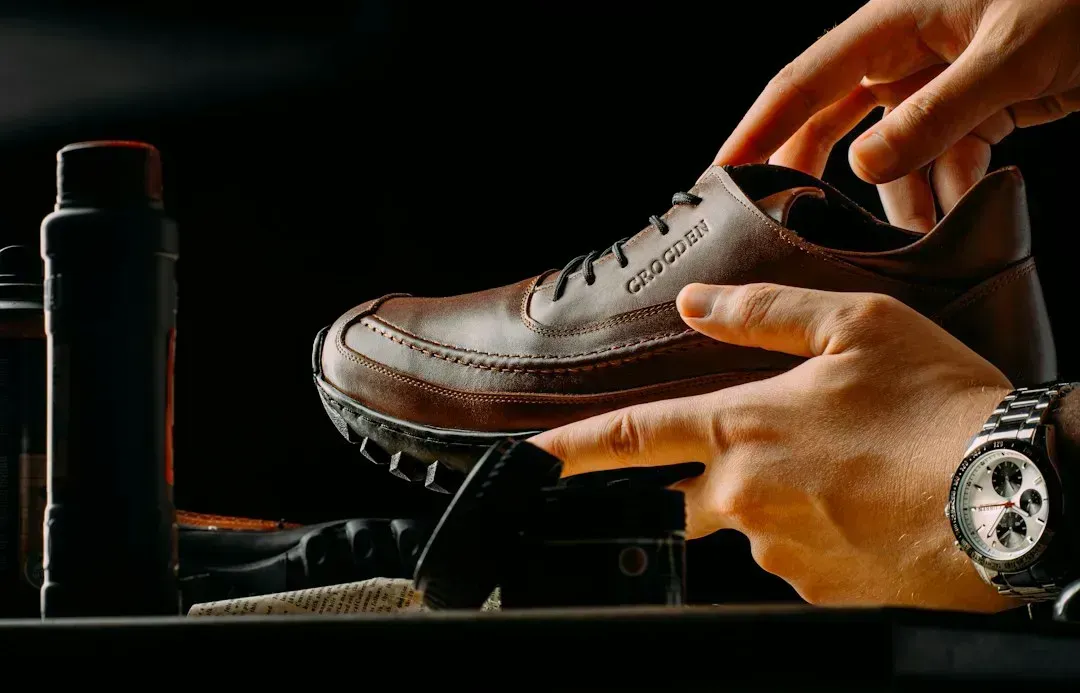2. Polishing shoes before school or work (Image Credits: Unsplash)