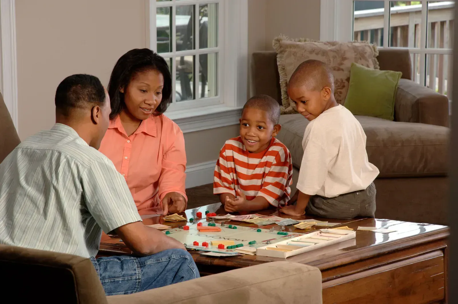 4. Playing Board Games and Card Games (This image was released by the National Cancer Institute, an agency part of the National Institutes of Health, with the ID 4505 (image) (next)., Public domain)