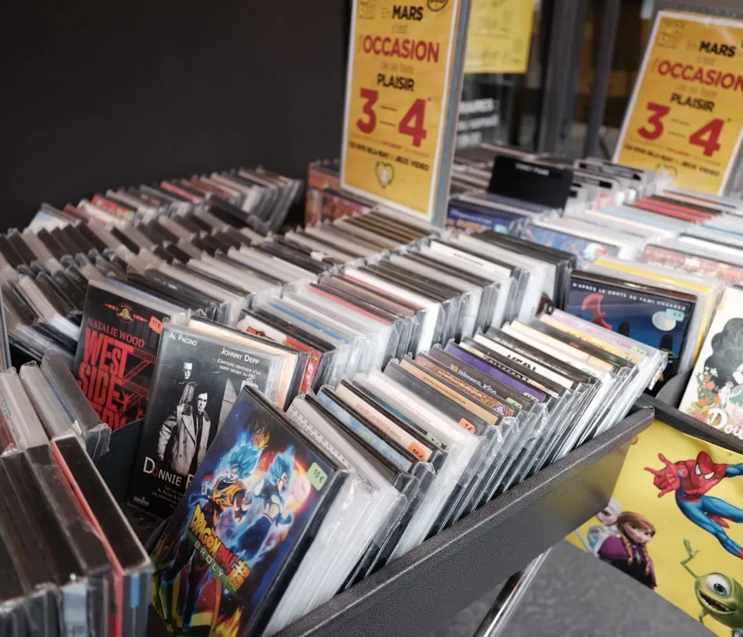 2. Physical DVDs and CDs (Image Credits: Unsplash)