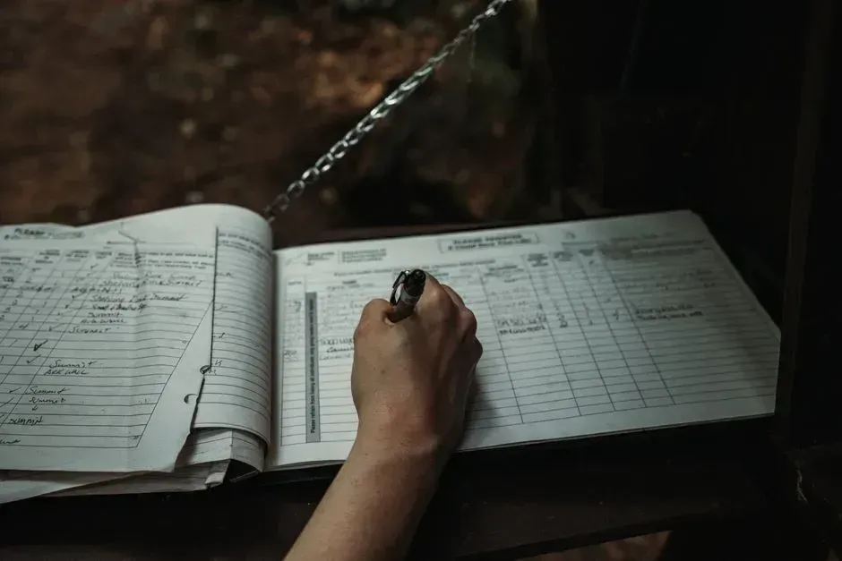 6. Writing or updating the pass-down notes (Image Credits: Pexels)