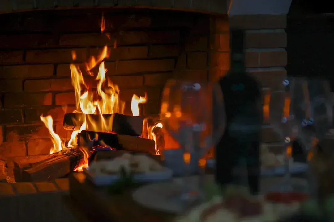 Brick Fireplaces with Raised Hearths (Image Credits: Unsplash)