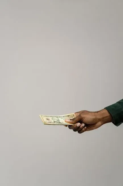 7. Using Cash for Nearly Everything (Image Credits: Pexels)