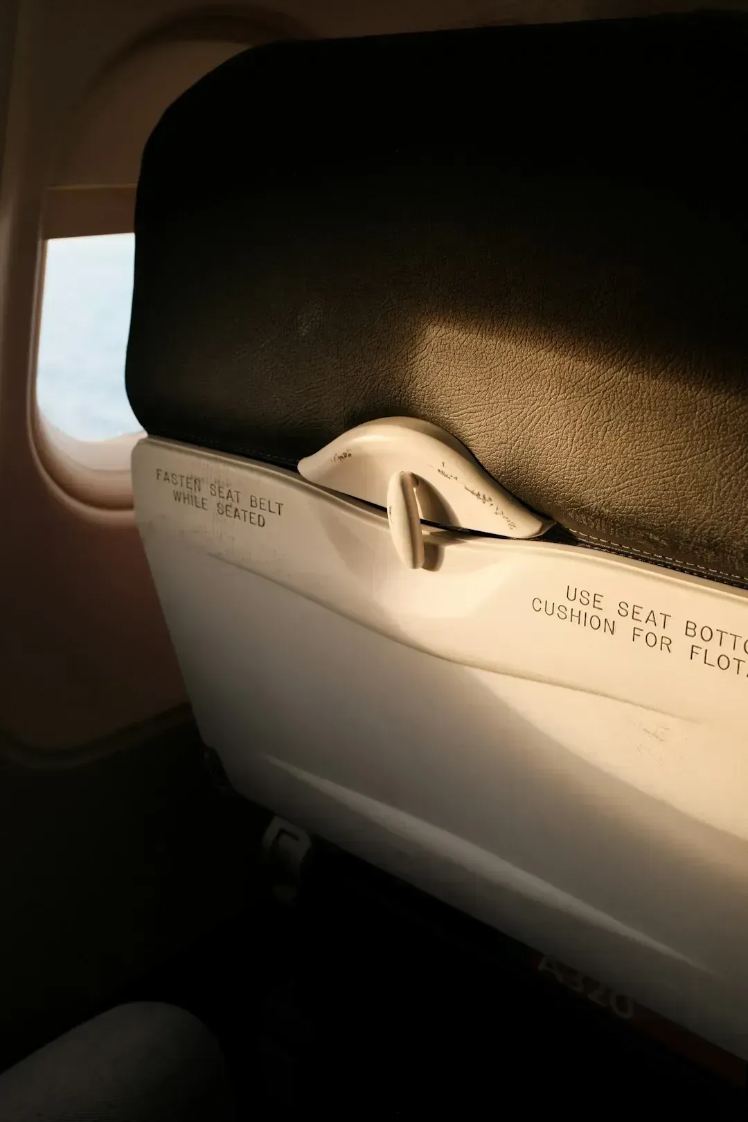 9. Changing a Baby's Diaper at the Seat or on the Tray Table (Image Credits: Unsplash)