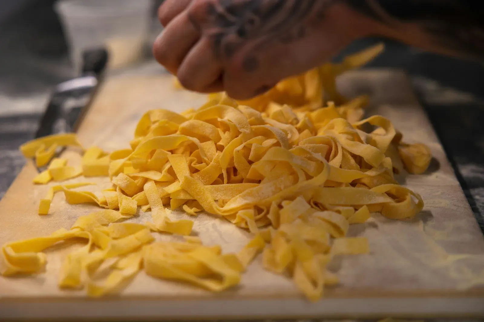 Cutting Tagliatelle (Image Credits: Unsplash)