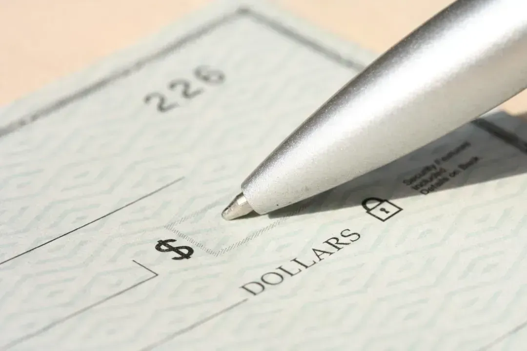 1. Writing Checks for Everything (Image Credits: Unsplash)