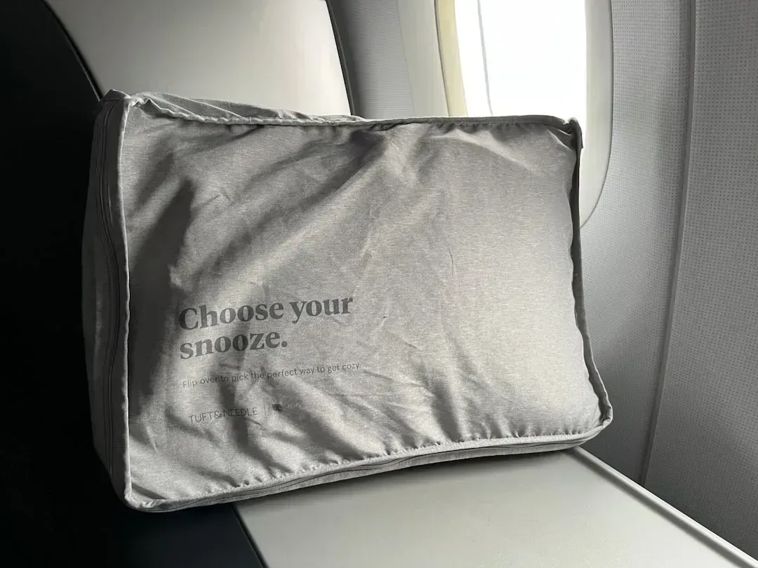 7. They bring their own sleep kit instead of relying on the airline's (Image Credits: Unsplash)