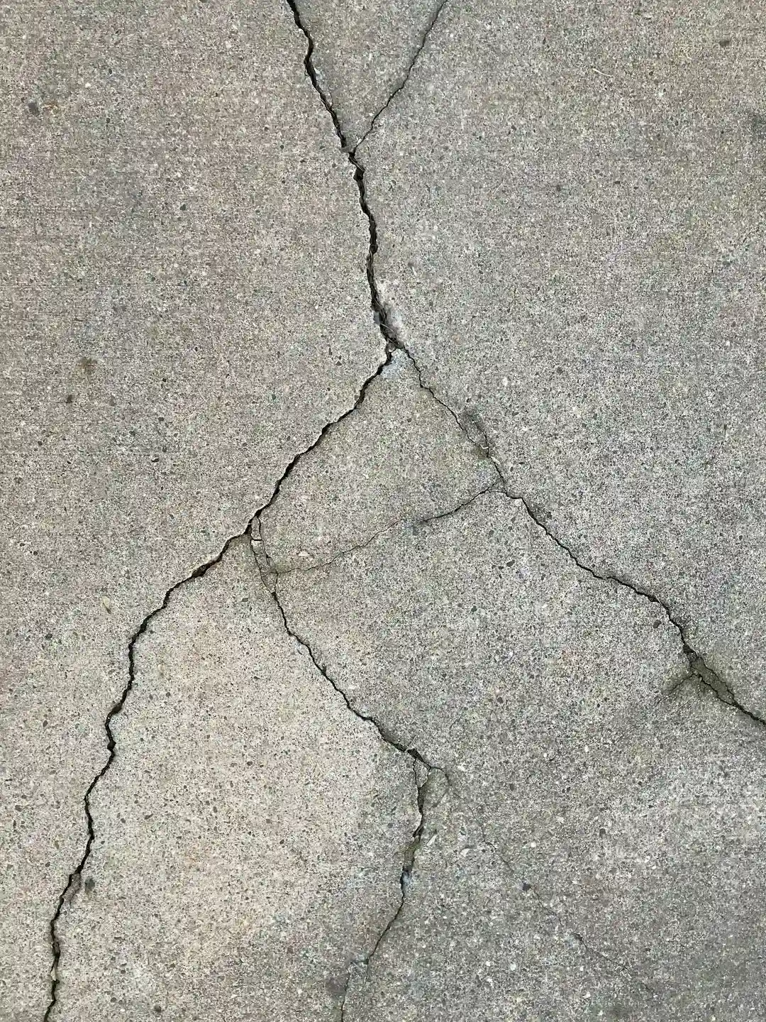 1. The State of the Sidewalks and Curbs (Image Credits: Unsplash)