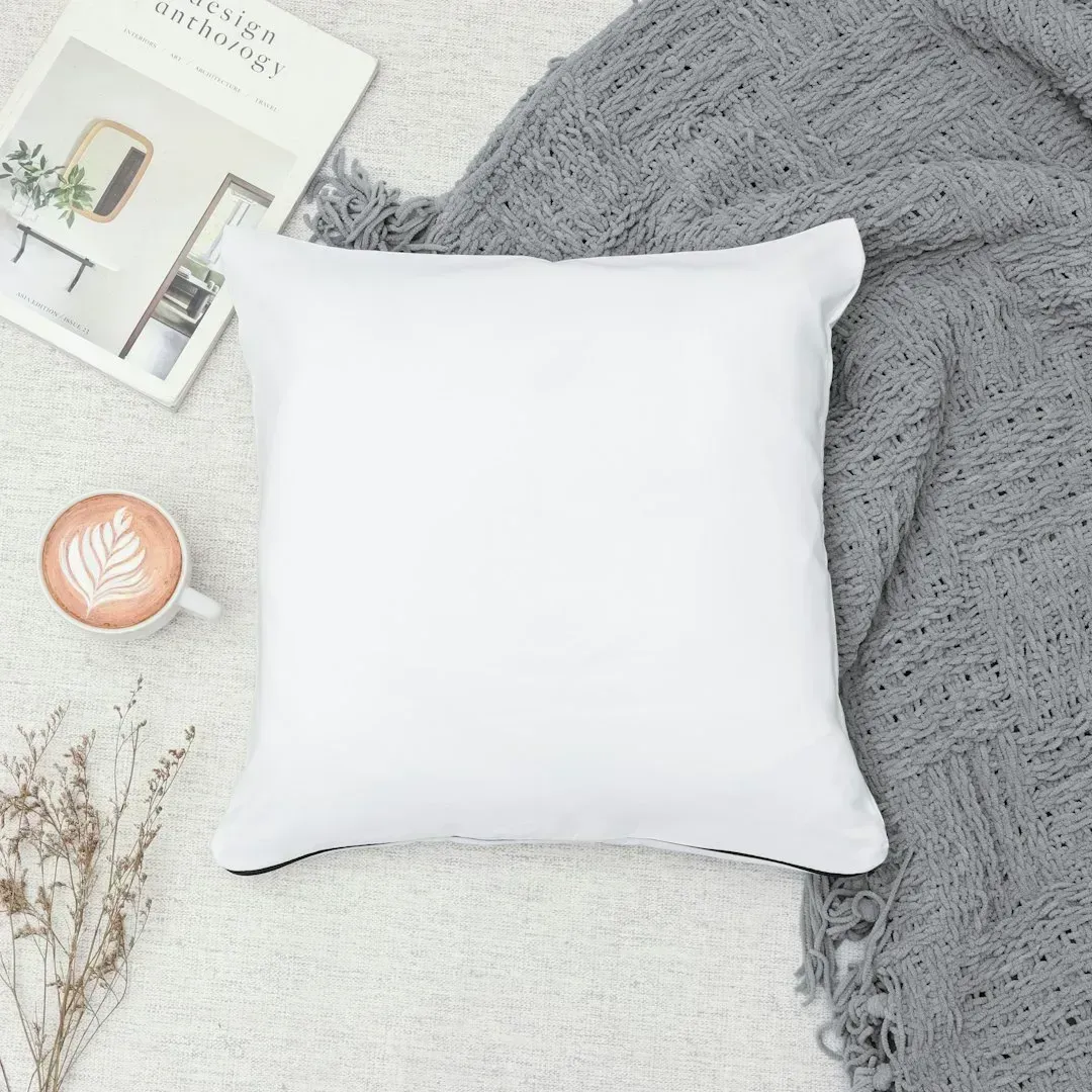 3. Excess Throw Pillows and Decorative Blankets (Image Credits: Unsplash)