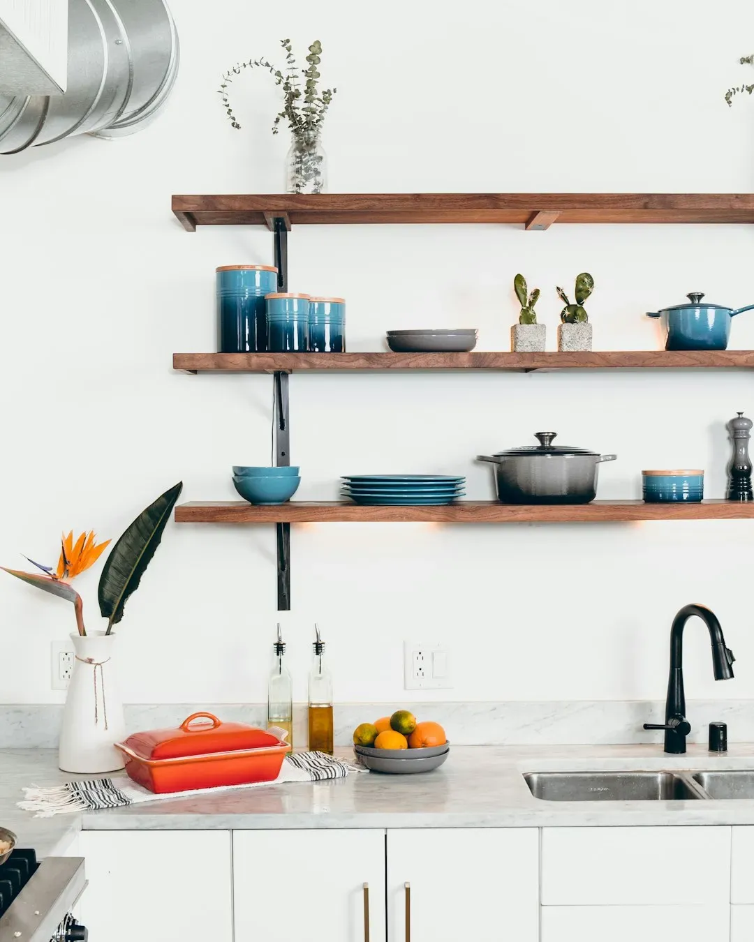 2. Open shelving as a kitchen default (Image Credits: Unsplash)