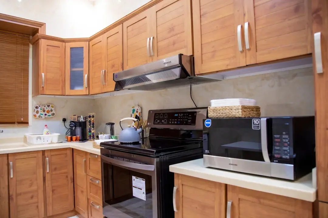 3. Orange-toned oak cabinets (Image Credits: Unsplash)