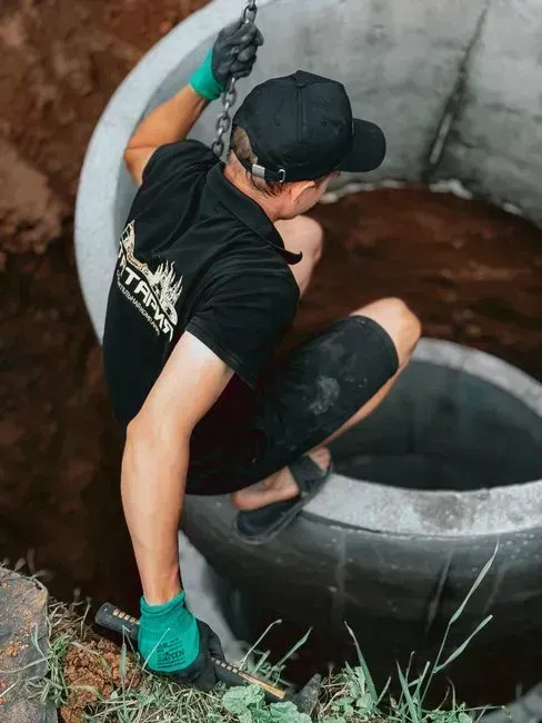 10. Working on a septic system (Image Credits: Pexels)