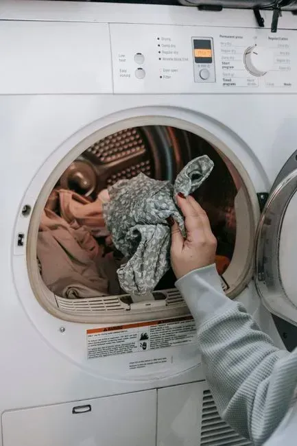 Overloading The Washing Machine (Image Credits: Pexels)