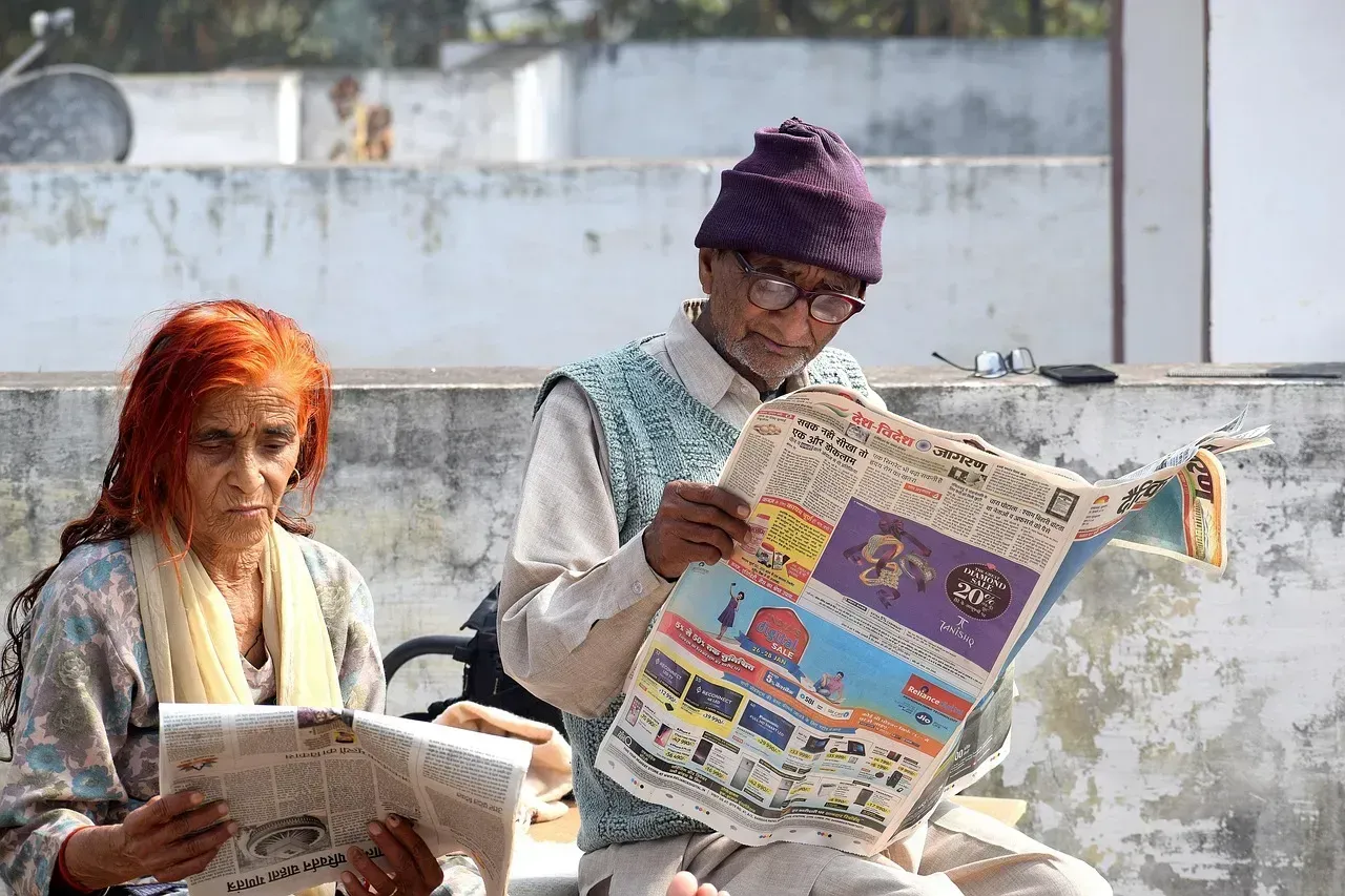 4. Reading the physical newspaper cover to cover (Image Credits: Pixabay)