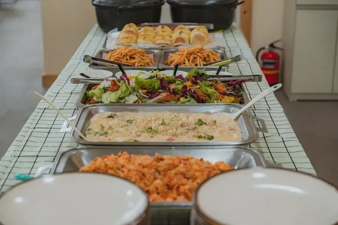 2. Letting kids run the buffet line unsupervised (Image Credits: Unsplash)