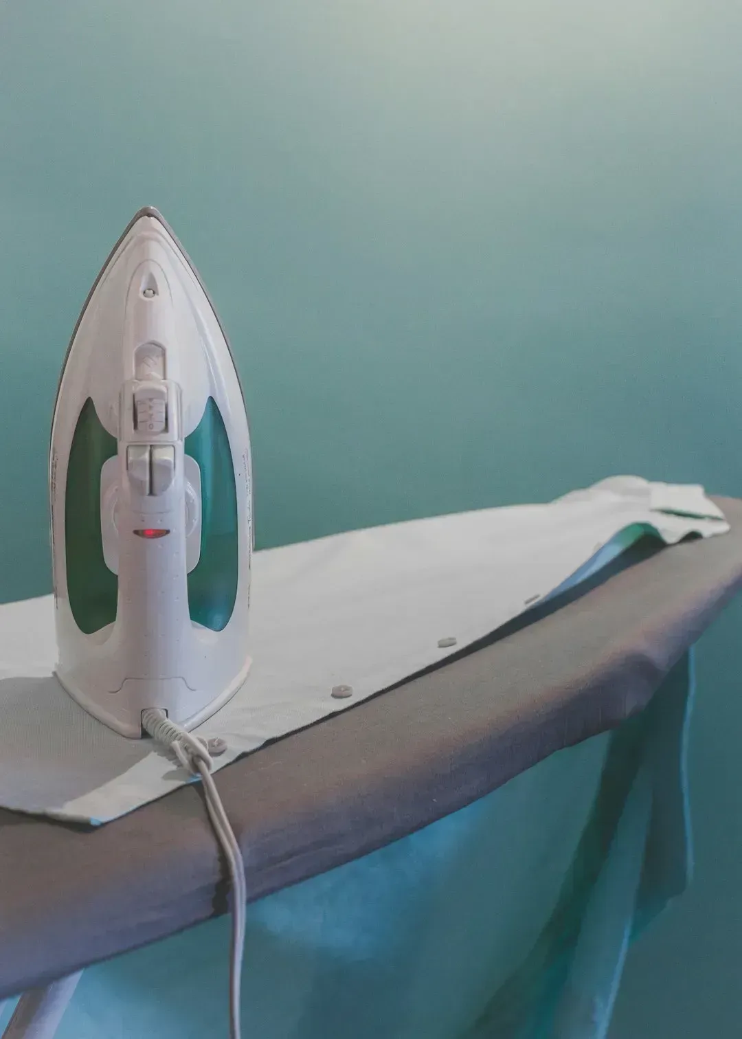1. Ironing clothes every single morning (Image Credits: Unsplash)