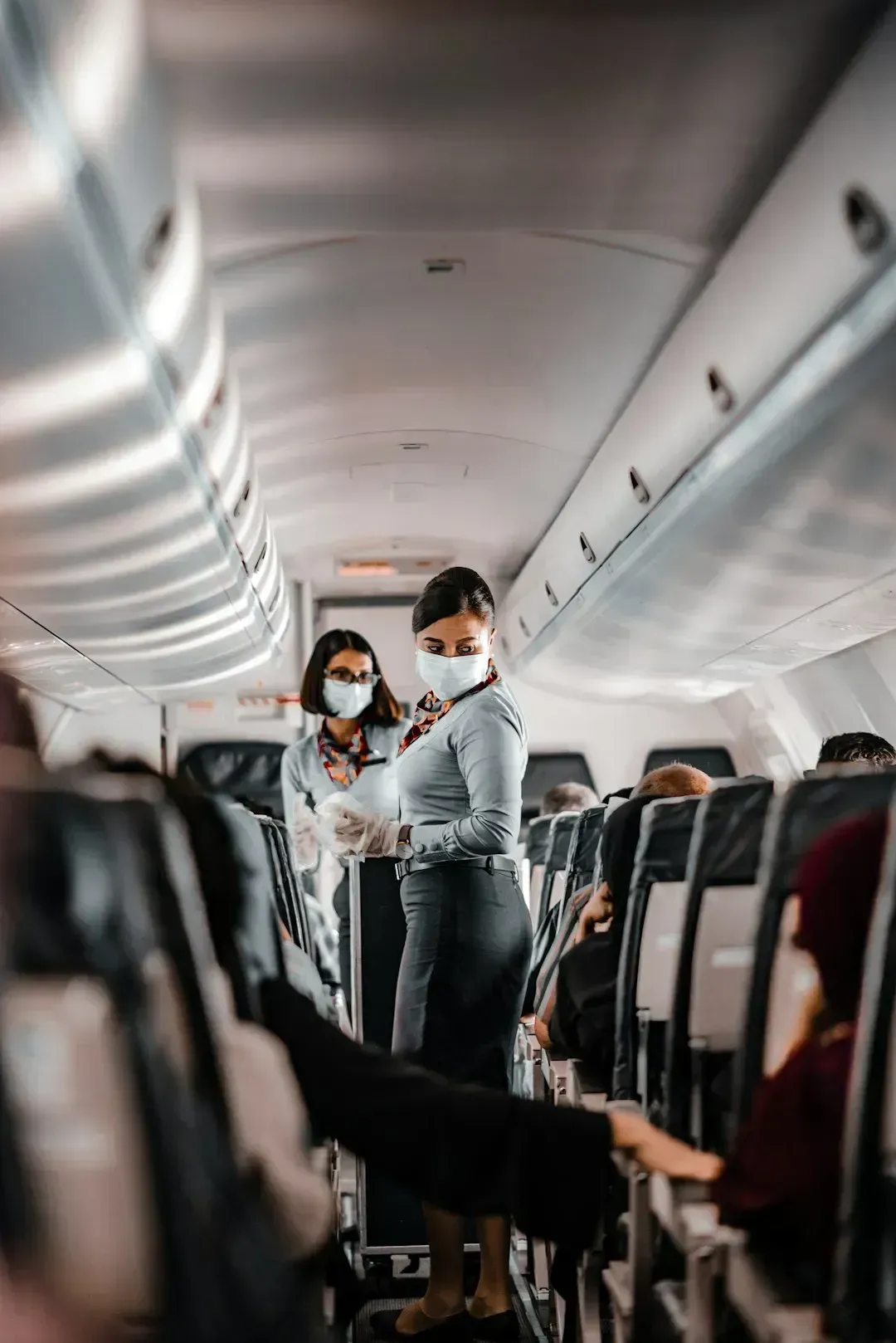 6. Quiet help stowing bags overhead or finding space nearby (Image Credits: Unsplash)