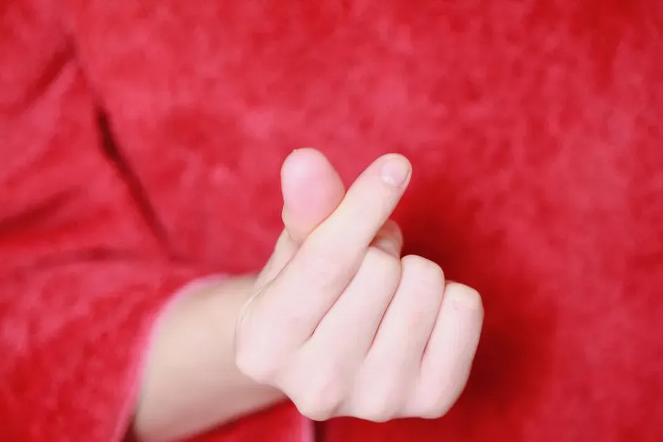 1. Snapping Your Fingers to Get a Server's Attention (Image Credits: Pexels)