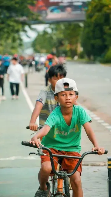 1. Riding Bikes for Hours Without a Helmet or a Destination (Image Credits: Pexels)