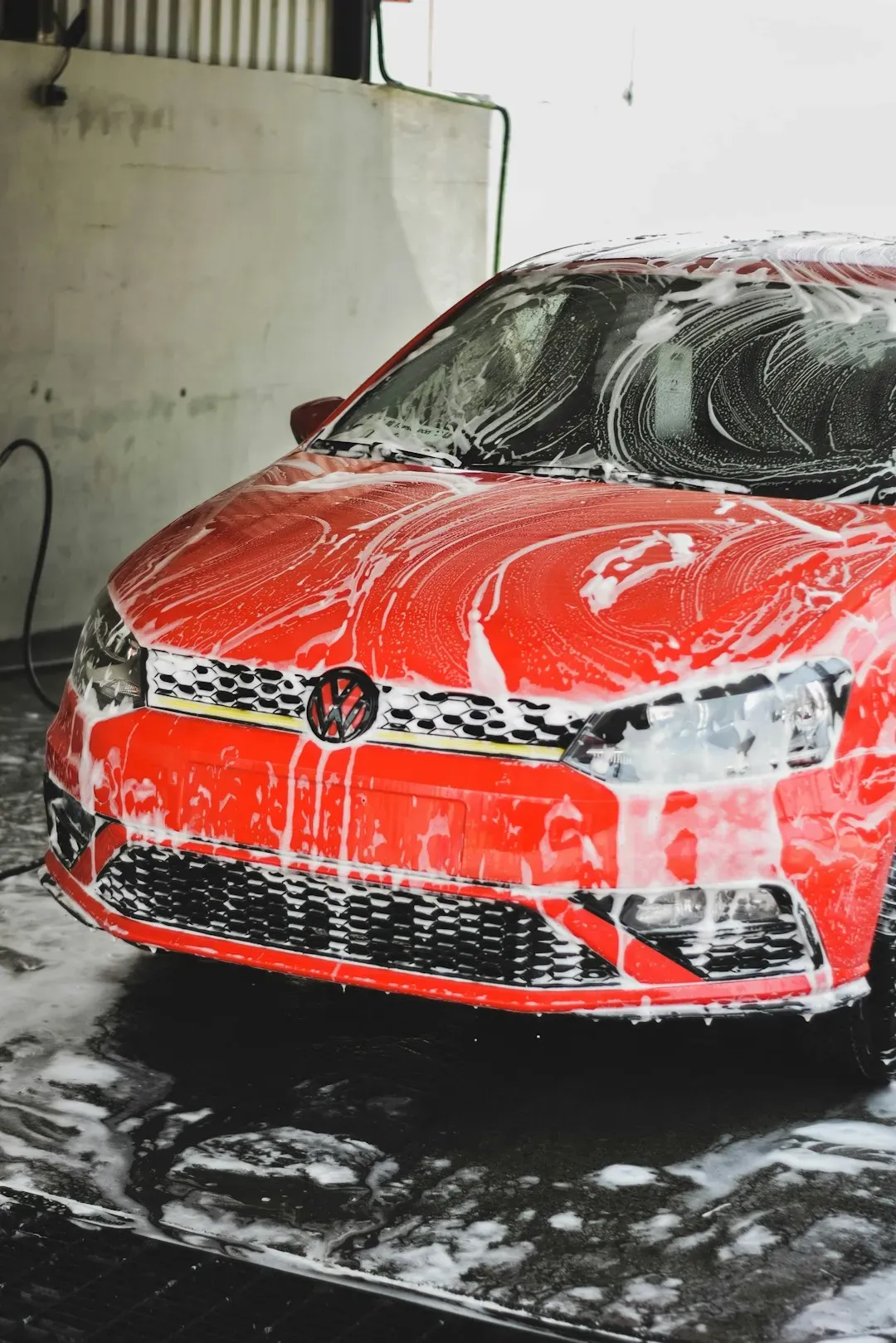 11. Washing the Family Car (Image Credits: Unsplash)