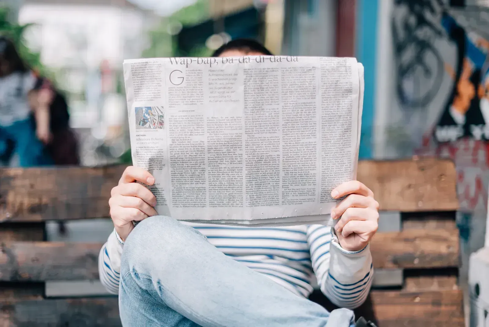 5. Reading the physical newspaper cover to cover (By Roman Kraft romankraft, CC0)
