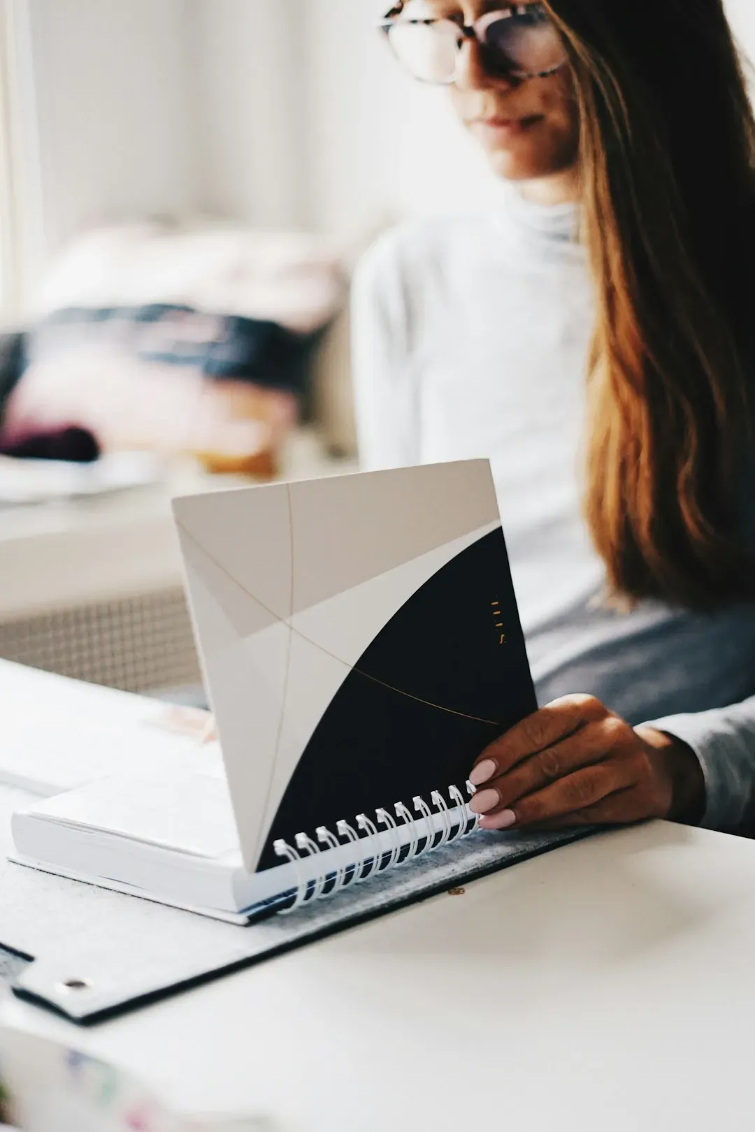 4. Keeping a Paper Planner or Journal (Image Credits: Unsplash)