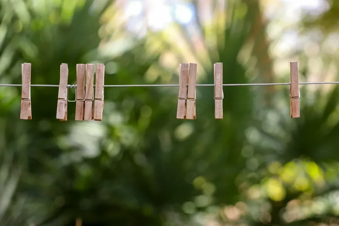 11. Line-drying laundry outside on a clothesline (Image Credits: Unsplash)