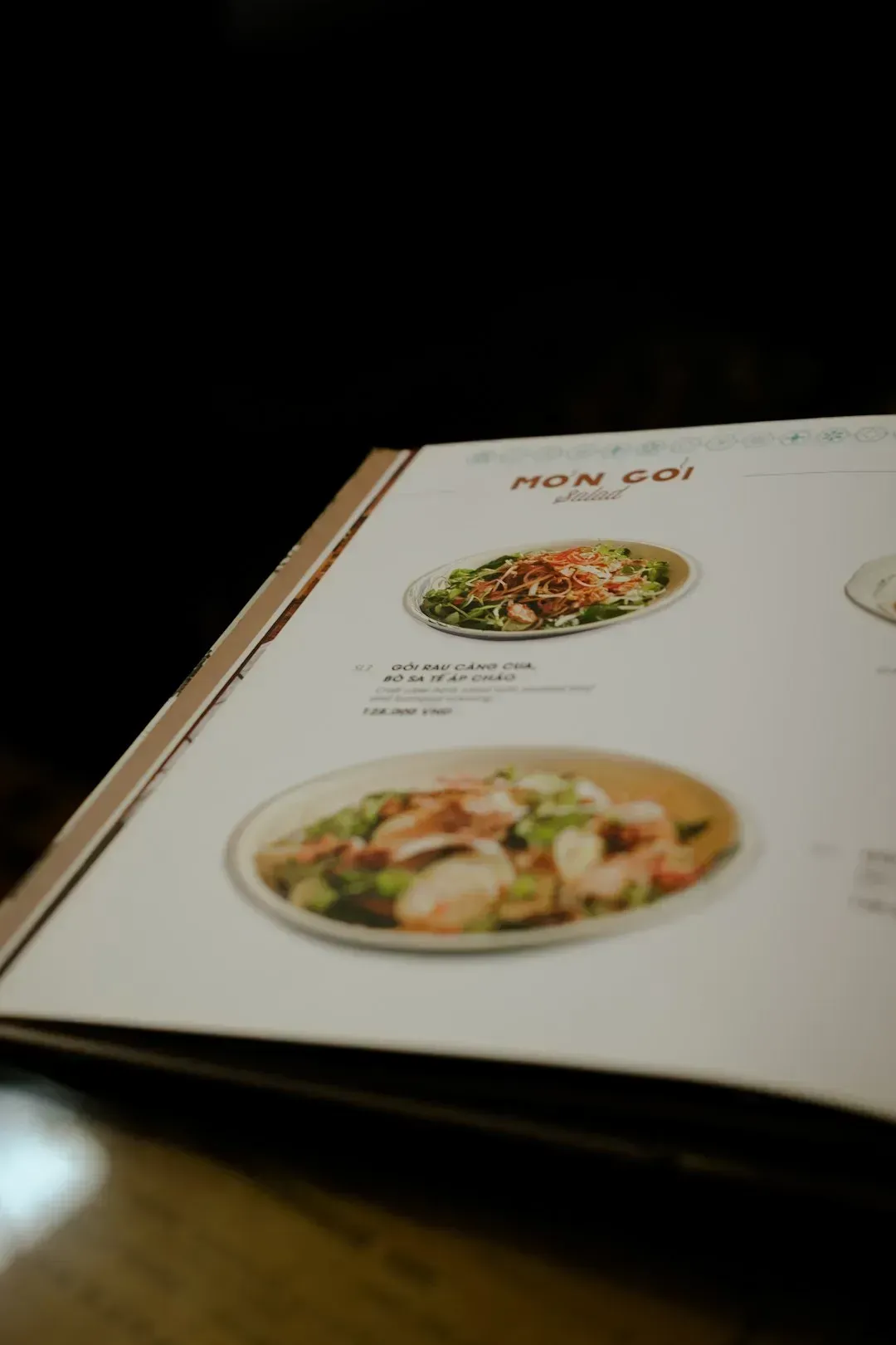 10. Snapping photos of the menu without asking (Image Credits: Unsplash)