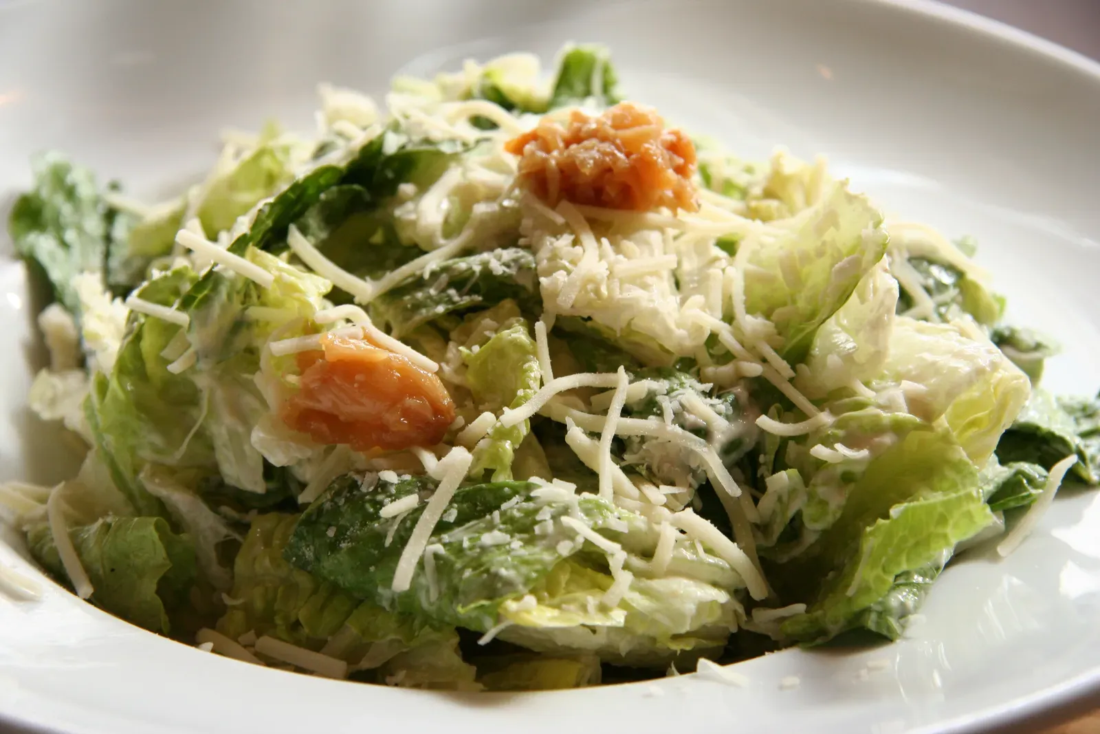6. Anchovy-forward dishes like Caesar salad and certain pizzas (Wonderful Caesar salad, CC BY 2.0)