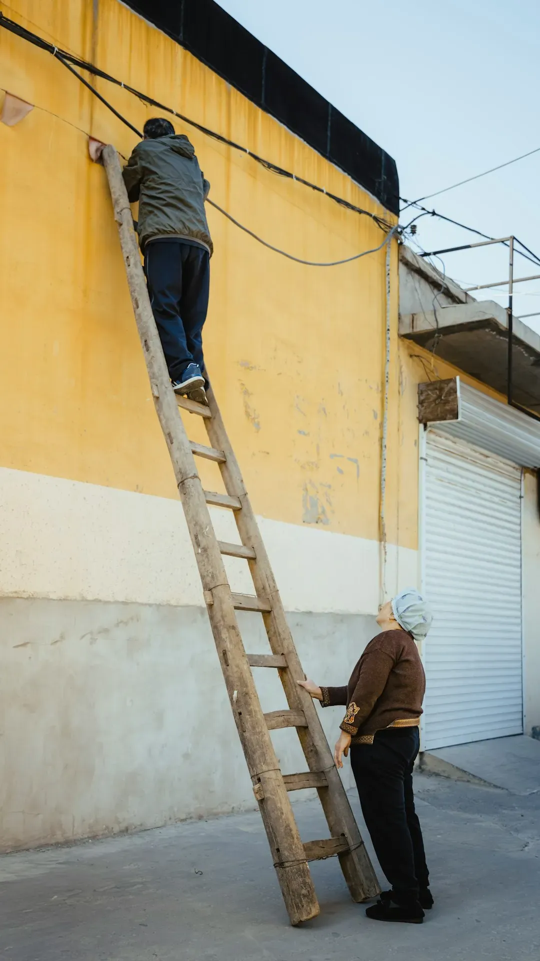 1. Climbing ladders or step stools (Image Credits: Unsplash)