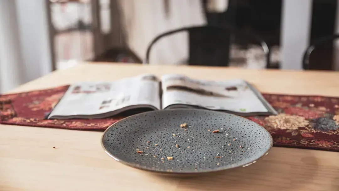 Crumb Scraping Between Courses (Image Credits: Unsplash)