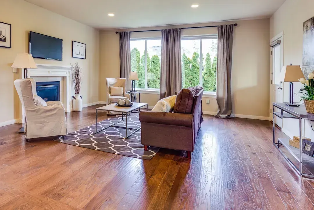 6. Carpet Installed Over Original Hardwood (Image Credits: Unsplash)