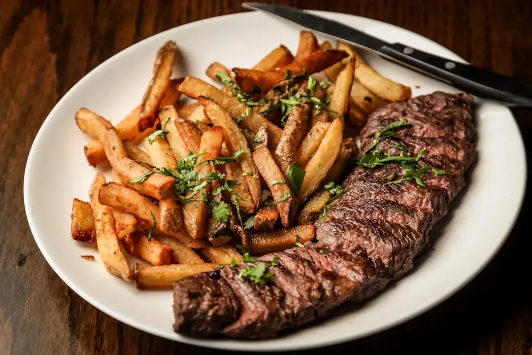 Steak still gets the reservation, but it isn't the whole story (Image Credits: Unsplash)