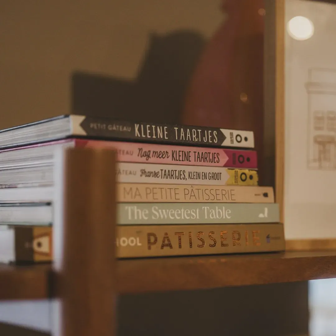 5. Oversized Collections of Physical Cookbooks (Image Credits: Unsplash)