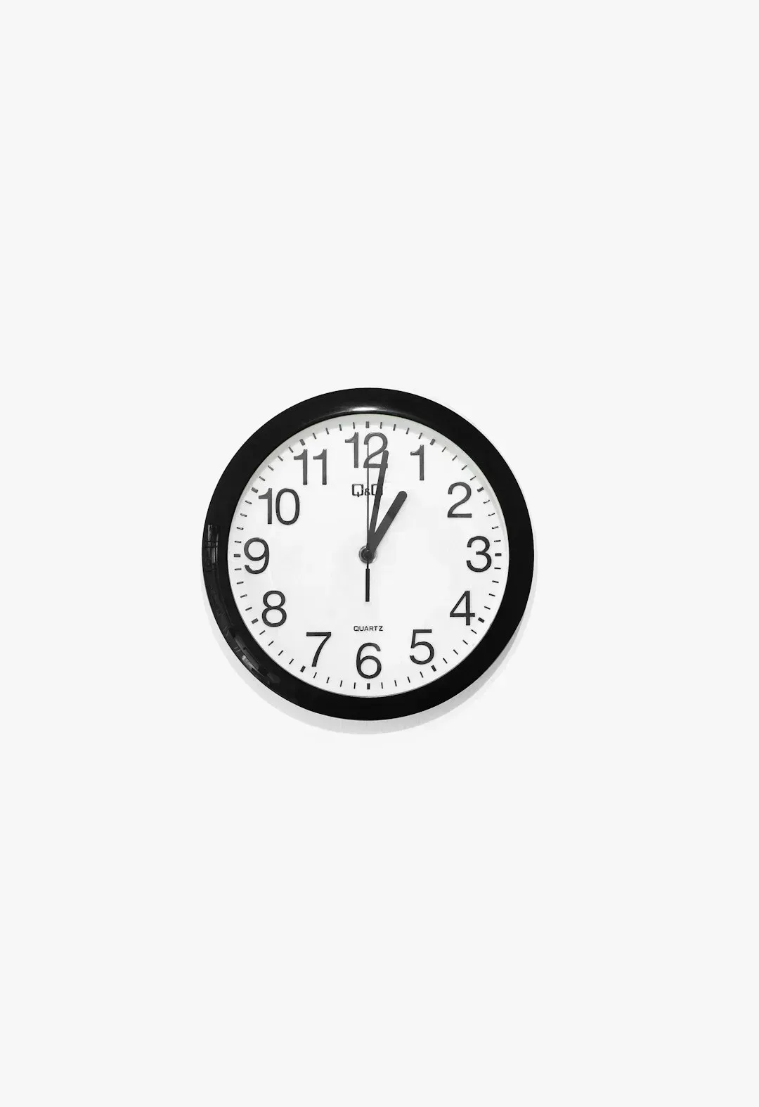 3. Telling Time on an Analog Clock (Image Credits: Unsplash)