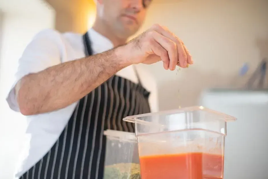 2. Tasting and adjusting as you go (Image Credits: Pexels)