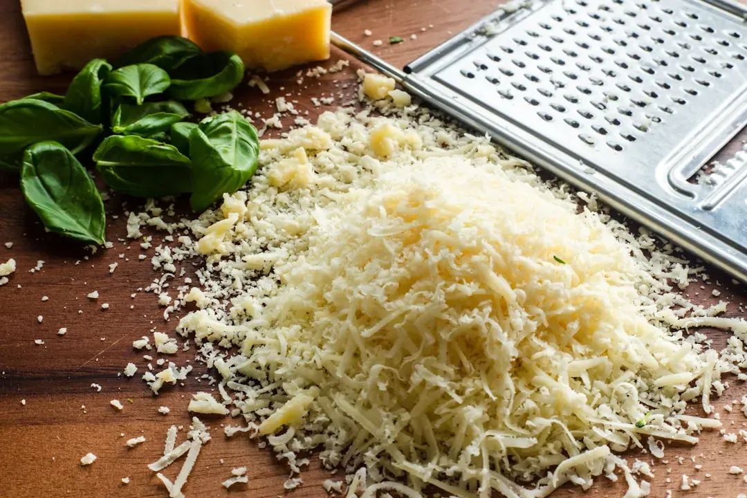 7. Shredded Cheddar Cheese: The Golden Topper That Ties Everything Together (Image Credits: Unsplash)