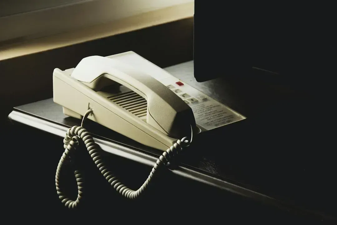 3. Landline telephones with cords (Image Credits: Unsplash)