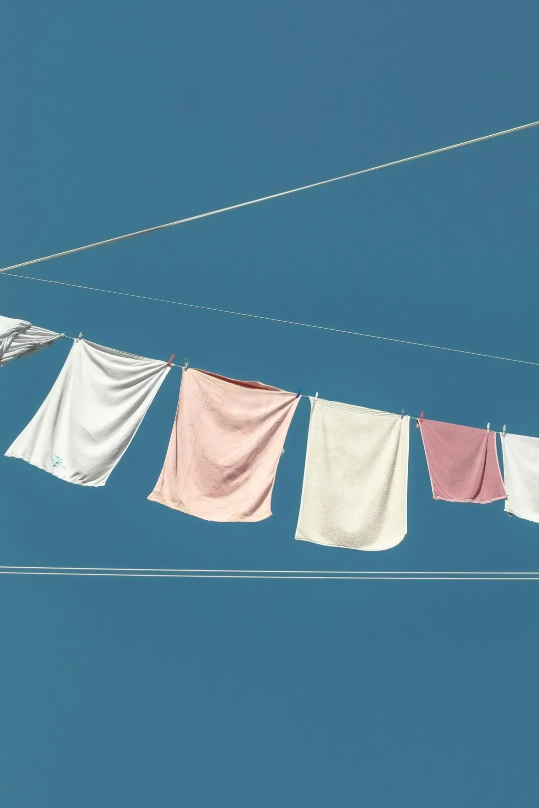 9. Doing Laundry and Hanging Clothes to Dry (Image Credits: Unsplash)