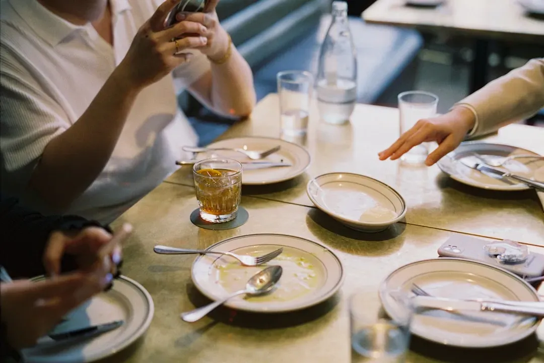 6. How You Treat the People at Your Own Table (Image Credits: Unsplash)