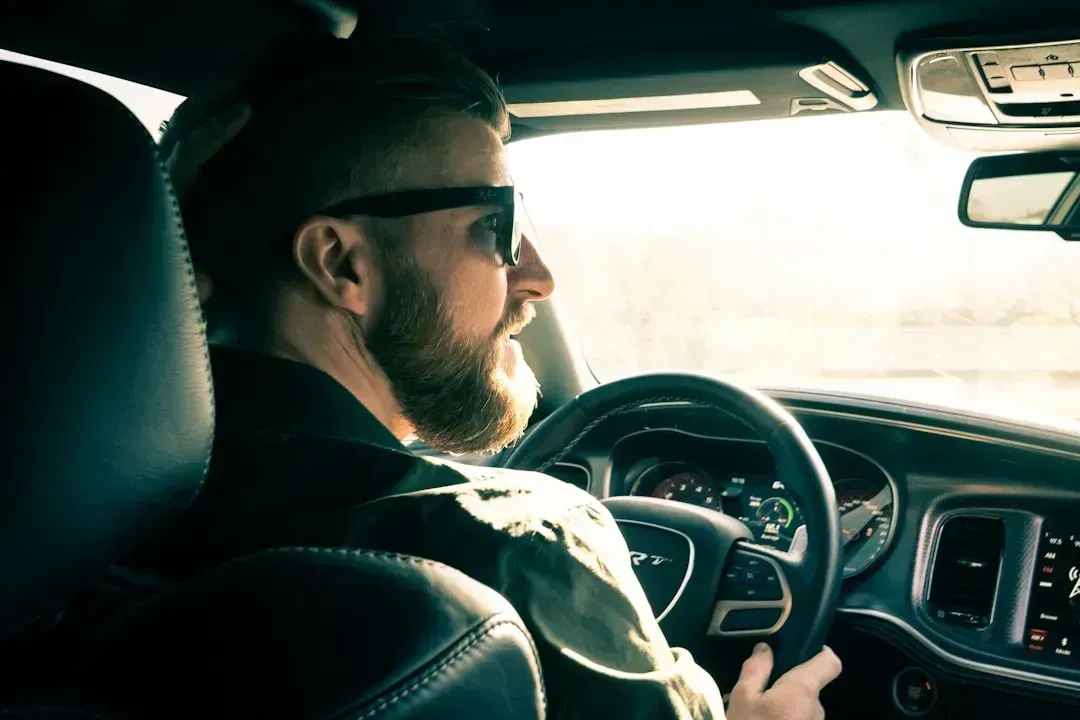 3. Driving Modest, Reliable Vehicles (Image Credits: Unsplash)