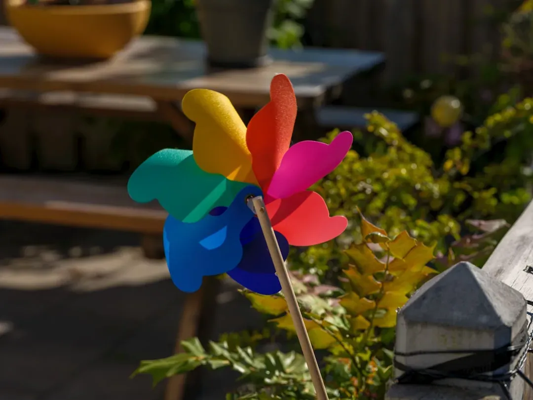 3. Wind Spinners Multiplying Across the Lawn (Image Credits: Unsplash)