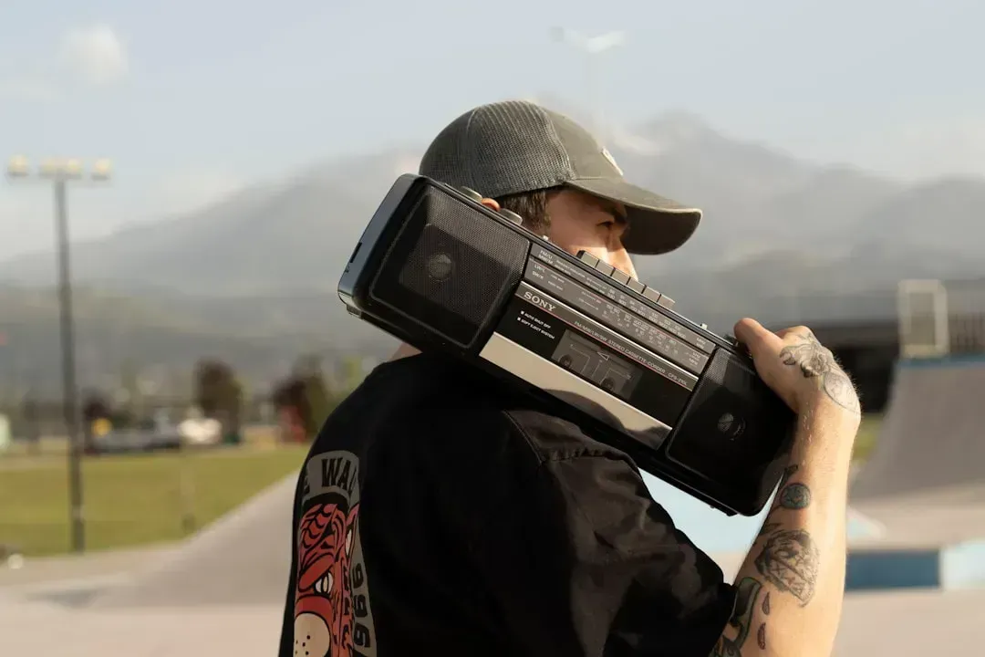 1. Carrying a Boombox on Your Shoulder (Image Credits: Unsplash)