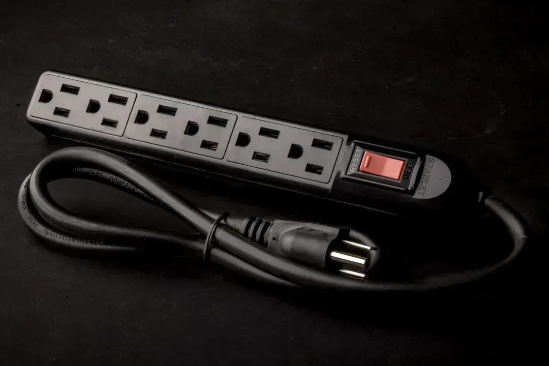 5. Bringing a Surge-Protected Power Strip (Image Credits: Unsplash)