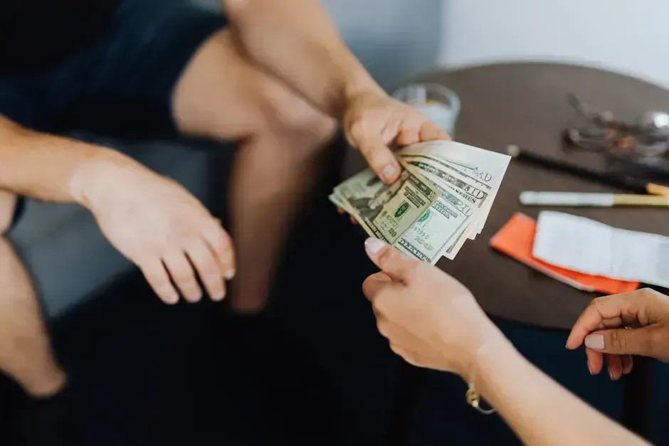 2. Insisting on Paying the Bill (Image Credits: Pexels)