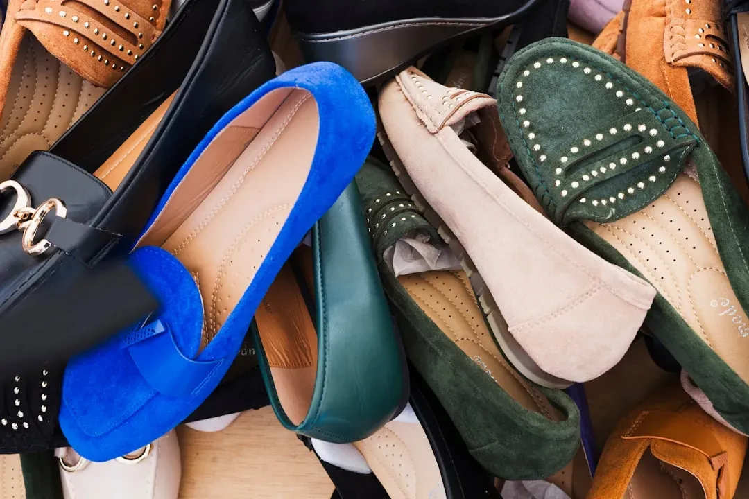 5. Piles of Unsorted Shoes (Image Credits: Unsplash)