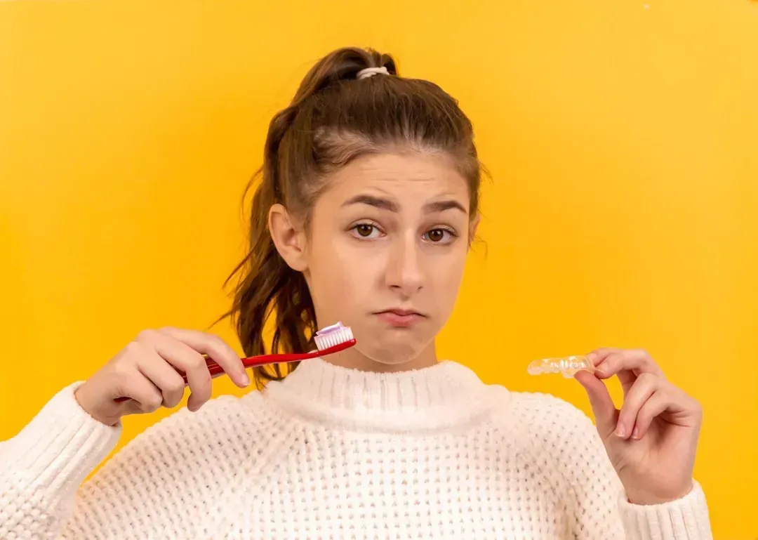 1. Brushing Your Teeth the Wrong Way (Image Credits: Unsplash)