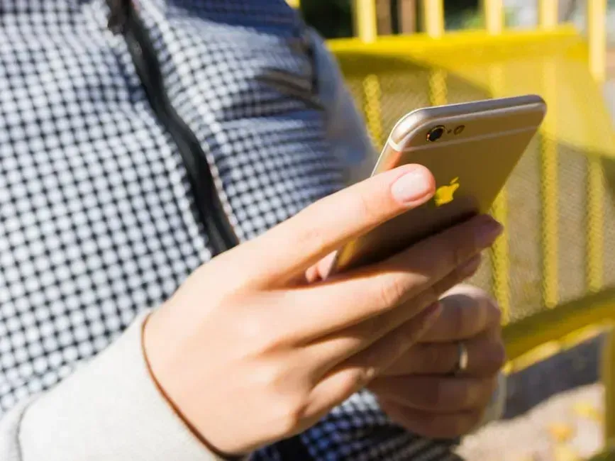 4. Being Caught Checking Your Phone During a Conversation (Image Credits: Pexels)